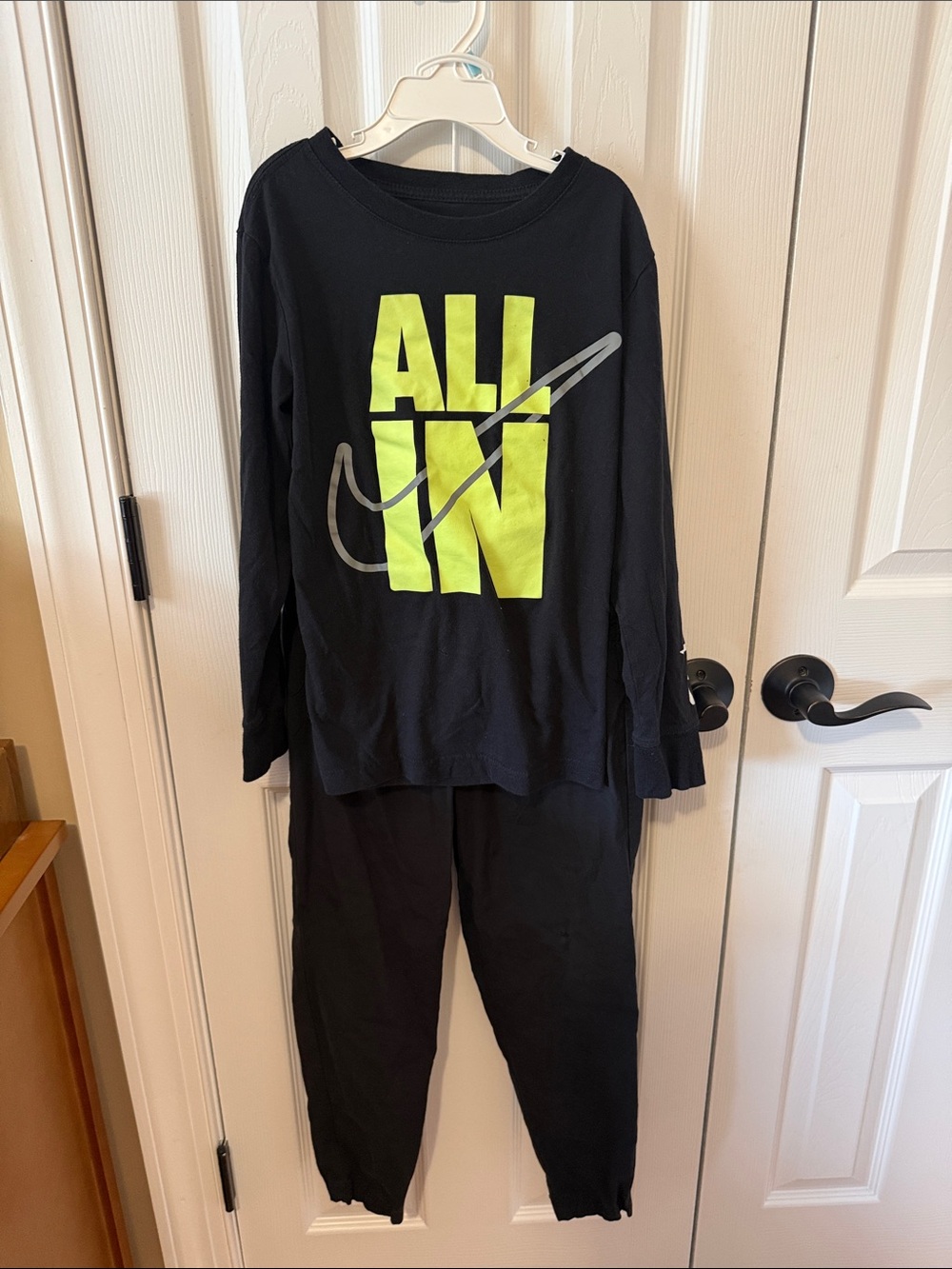 Kids Black Nike long sleeve tee and Jumping Beans pants